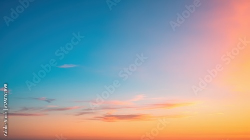 Fototapeta Naklejka Na Ścianę i Meble -  A serene sunset sky showcases vibrant hues of blue and soft peach, creating a tranquil atmosphere perfect for relaxation.