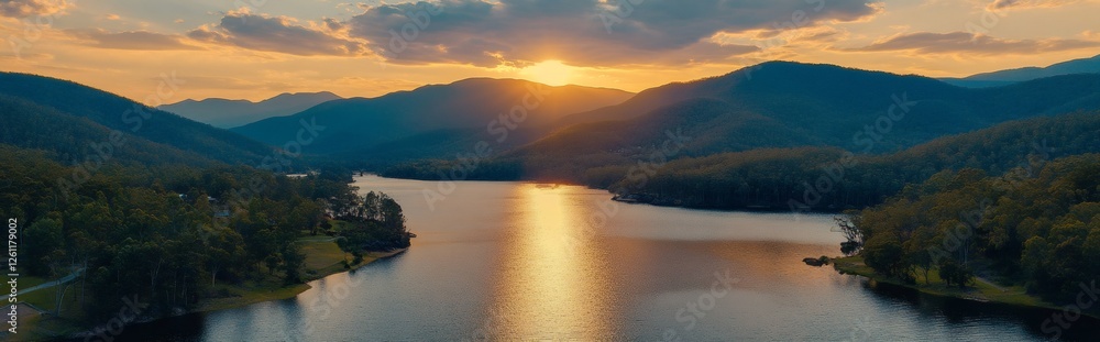 Golden sunset illuminating lake and mountains in tasmania, australia Golden sunset illuminating lake and mountains in tasmania, australia