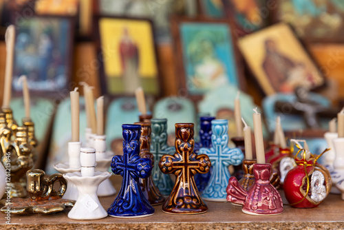 Religious Catholic souvenirs sold near a church on Tinos Island, Greece.  photo