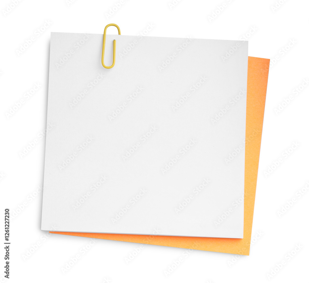 Blank paper notes attached with clip isolated on white, top view Blank paper notes attached with clip isolated on white, top view