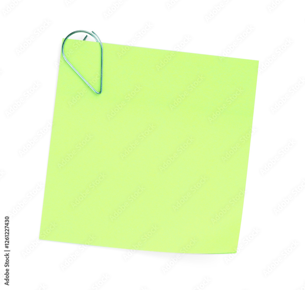 Blank paper note attached with clip isolated on white, top view