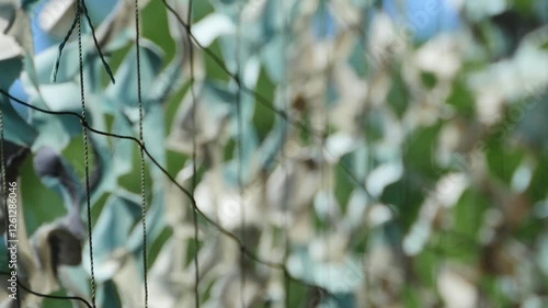 view of camouflage net from inside, military