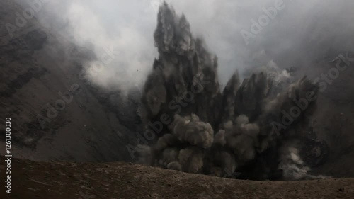 Ash-rich eruptions from rim of active crater on Mount Yasur volcano in Vanuatu.