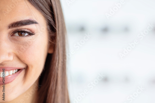 Free Download Close-Up of a Smiling Person with Glowing Skin and Brown Eyes - GFXLoad