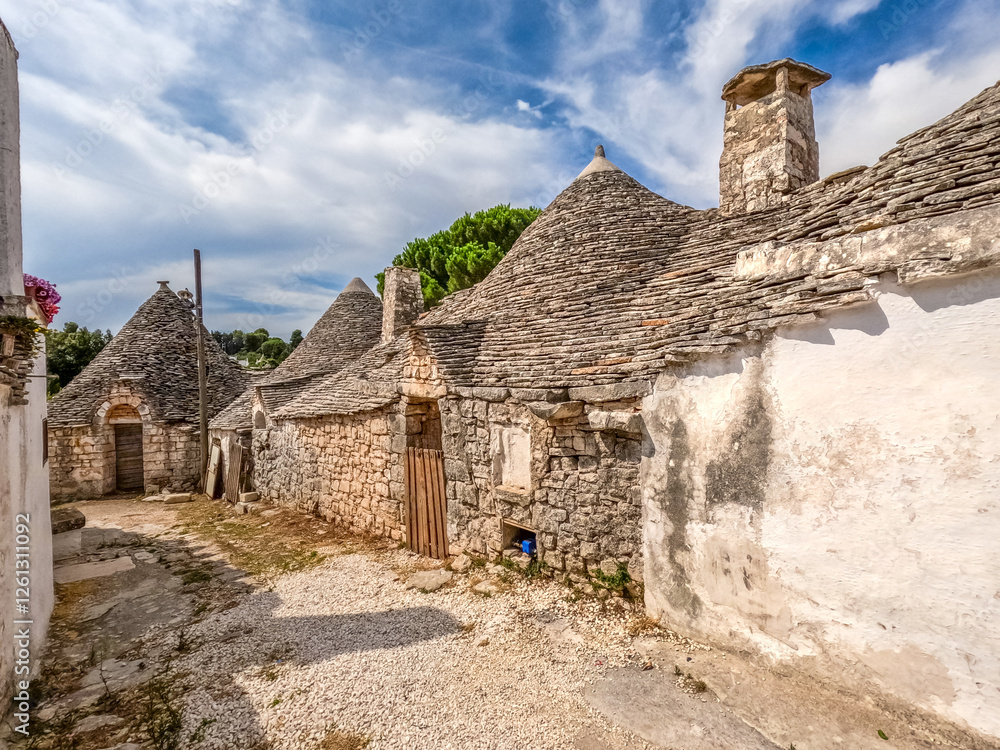 View of Alberobello town, Puglia region, Italy. View of Alberobello town, Puglia region, Italy.