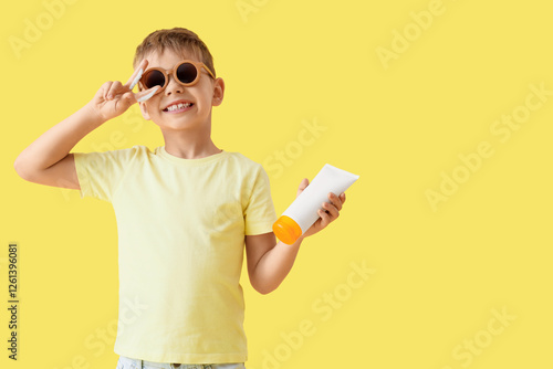 Cute little boy in sunglass...