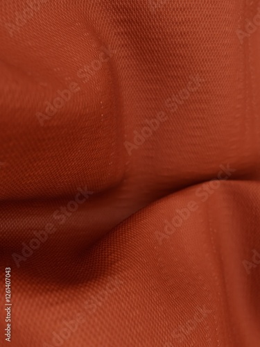 close-up shot of brown woven fabric with soft folds photo