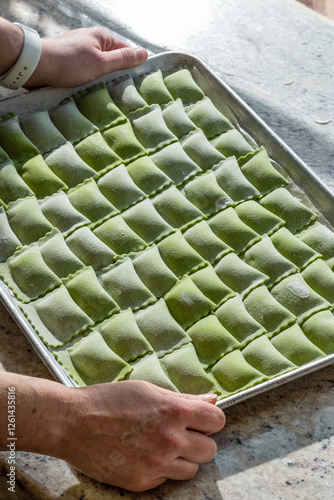 Ready for Cooking: Tray of Handmade Green Ravioli