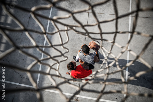 Above the Game: Aerial View of a Street Basketball Match