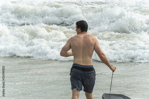 boogie boarding at Poipu beach photo