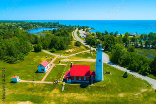 Bild auf Leinwand East Tawas lighthouse Tawas Point Light Station is located in the Tawas Point State Park off Tawas Bay in Lake Huron in Baldwin Township in Northern Michigan
