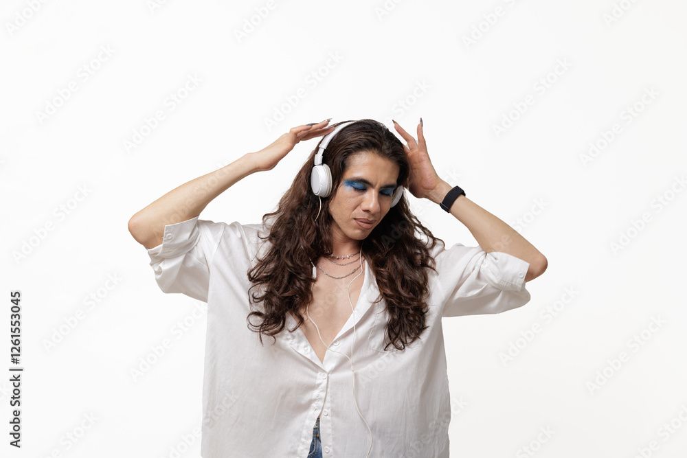Non-binary person, male, in editorial pose, wearing headphones and dancing on white background for web and copy space for desing Non-binary person, male, in editorial pose, wearing headphones and dancing on white background for web and copy space for desing