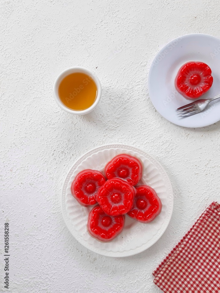 Fototapeta premium red cake with raspberries on white background