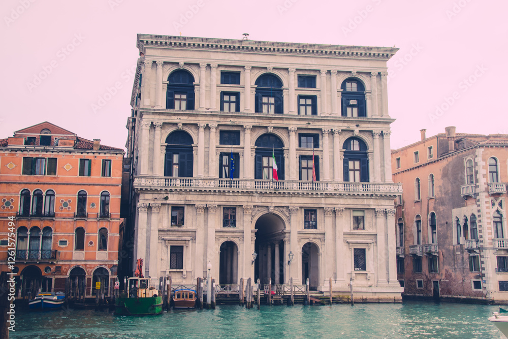 A grand historic building by the canal in Venice, Italy. A grand historic building by the canal in Venice, Italy.