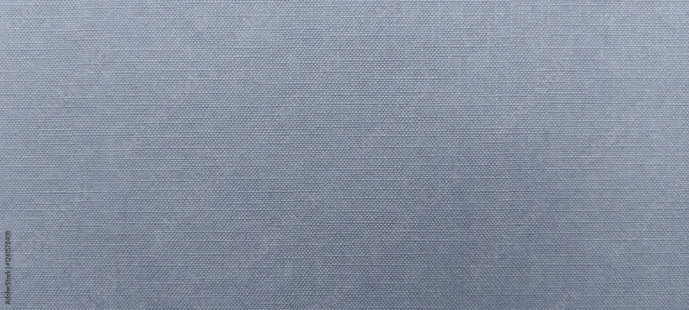 close up textured fabric surface as background, light blue color and features a woven pattern with small, creating a grid like texture, textile design, material quality, and manufacturing processes close up textured fabric surface as background, light blue color and features a woven pattern with small, creating a grid like texture, textile design, material quality, and manufacturing processes