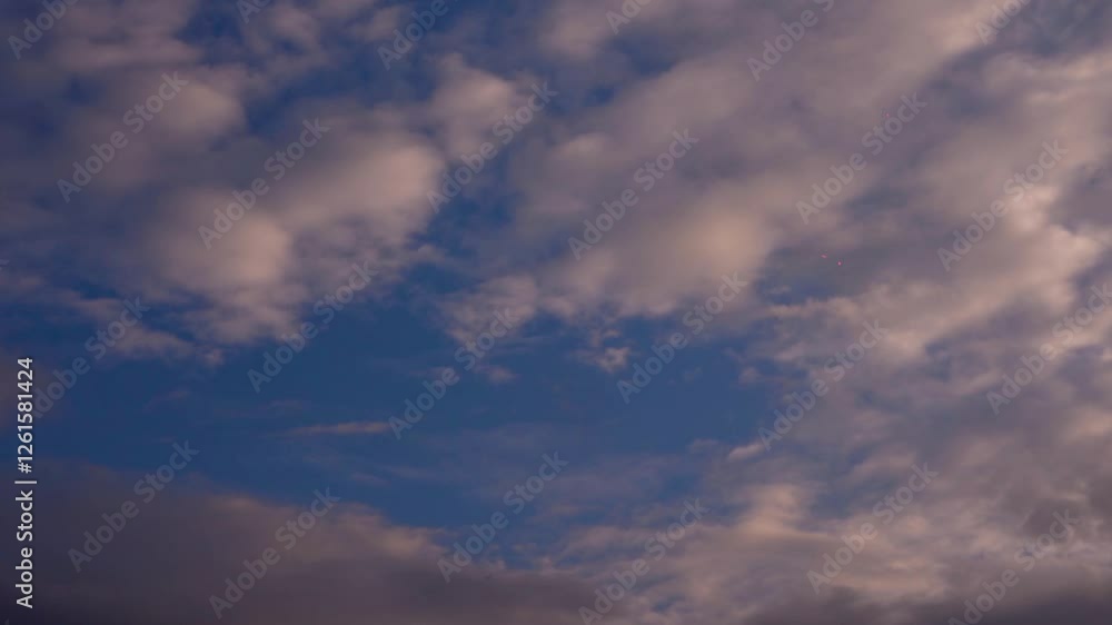 Clear very nice soft blue sky, white rolling in fast motion time lapse clouds in the horizon, relaxing day, fluffy, puffy lightness weather, 4K video white cloudscape.
Time lapse clouds. Clear very nice soft blue sky, white rolling in fast motion time lapse clouds in the horizon, relaxing day, fluffy, puffy lightness weather, 4K video white cloudscape.
Time lapse clouds.