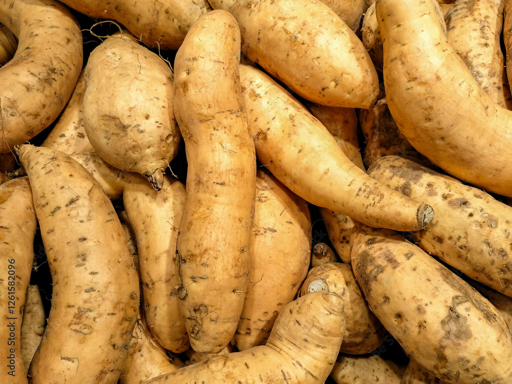 Close Up Of Root Vegetables Displayed At A Market Stall Close Up Of Root Vegetables Displayed At A Market Stall