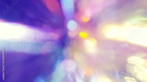 Crystal refracting and reflecting light rays, producing a stunning optical illusion of shine purple colors and bokeh