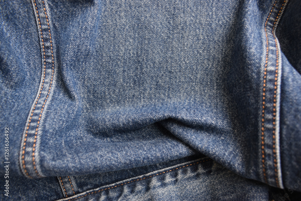 Fototapeta premium seam of blue denim texture background, jean fashion style