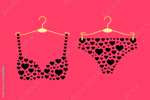 Underpants and bra made from heart symbols, black lingerie on hangers