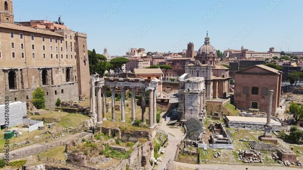 Iconic Roman ruins in the Forum, captured from above on a sunny day, Rome, Italy Iconic Roman ruins in the Forum, captured from above on a sunny day, Rome, Italy
