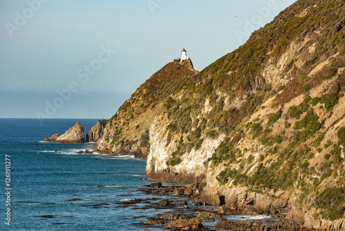 Iconic Nugget Point lighthouse on the Catlins Coast photo