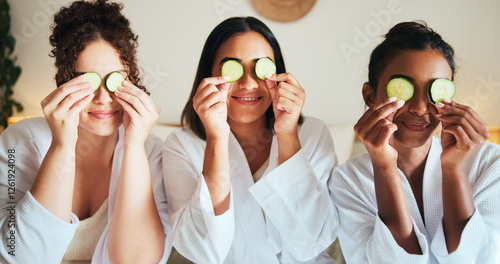 Skincare, friends and happy women with cucumber for beauty, dermatology or organic wellness at home spa. Girls, vegetable slice and together for facial treatment, cosmetics and pamper at sleepover
