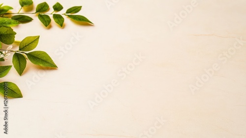 Green Leaves on Beige Wooden Background