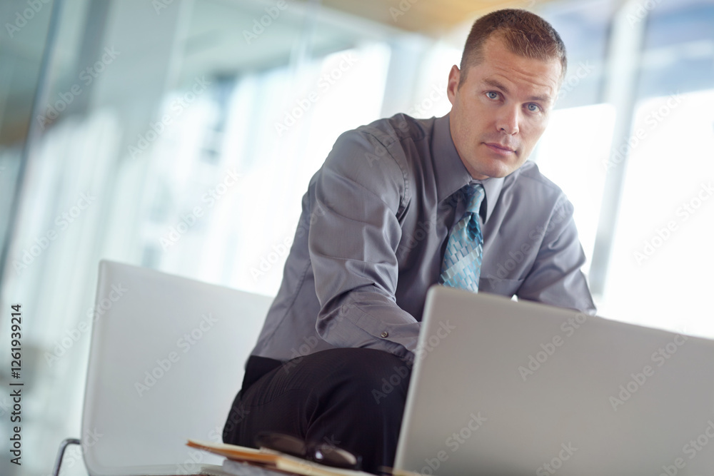 Laptop, portrait and research with business man in office for Saas account manager, engagement trends or cloud solutions. Subscription renewal, software platform and company integration with employee Laptop, portrait and research with business man in office for Saas account manager, engagement trends or cloud solutions. Subscription renewal, software platform and company integration with employee