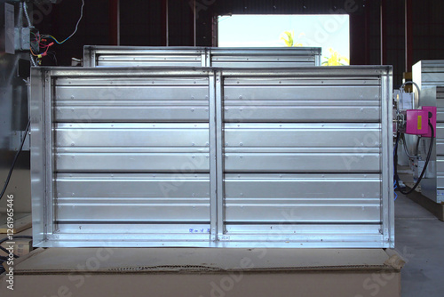 Close-up shot of flaps of fire damper.	
