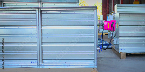 Close-up shot of flaps of fire damper.	
