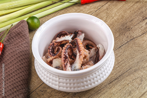 Grilled octopus tentacle sliced appetizer photo