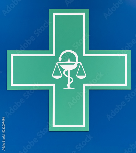 The staff of Aesculapius wrapped in a snake is a sign of vitality and health. This sign can be seen on all medical facilities.Emblem of doctors and pharmacists.