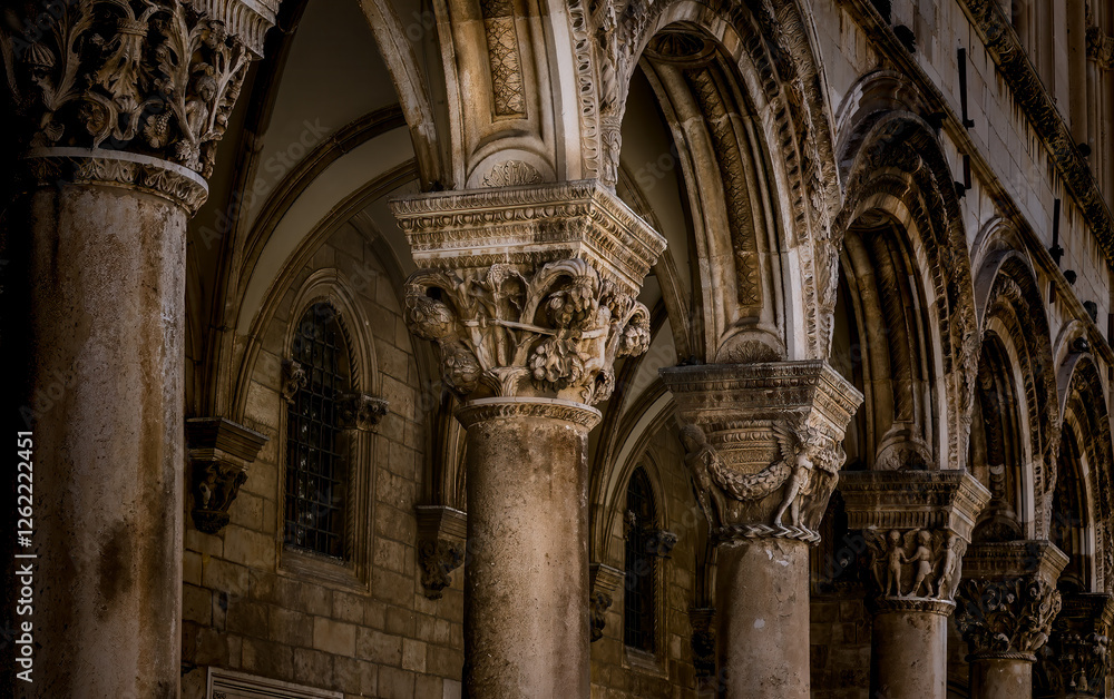 Intricately Designed Stone Column and Archway Structure in Historic Building Interior Intricately Designed Stone Column and Archway Structure in Historic Building Interior