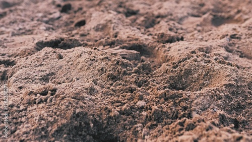 Muddy Ground Countryside Dirt Road with Footmarks and Hoofmarks Low Angle Push Forward