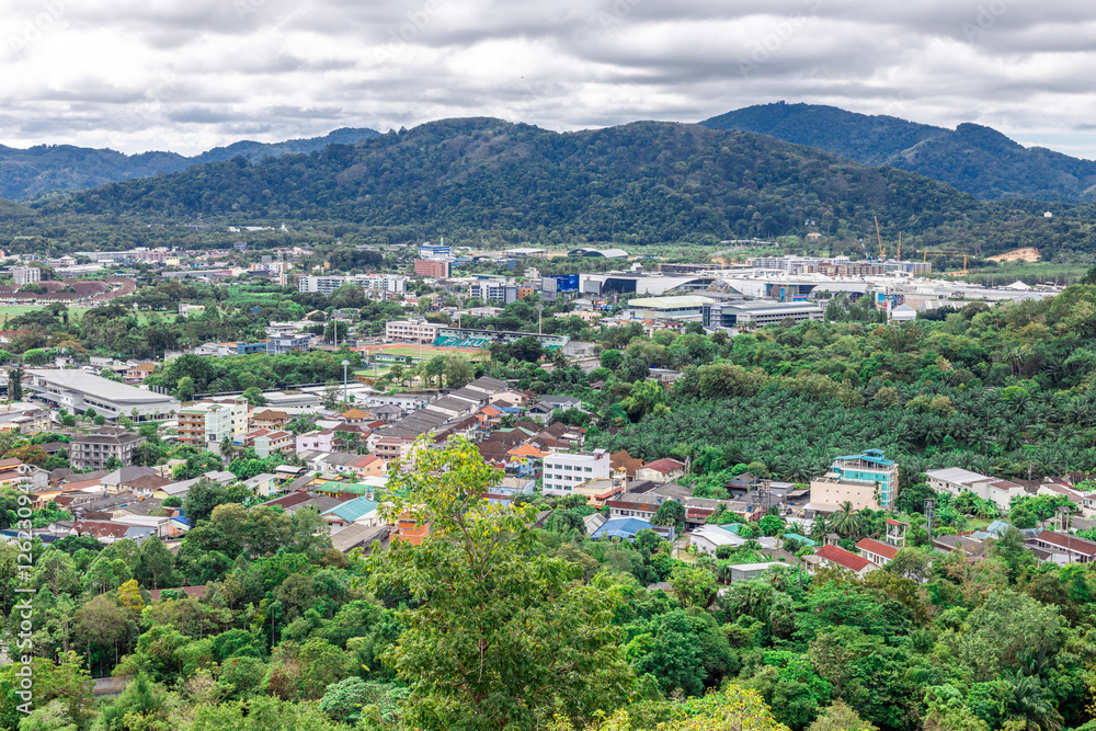Obraz premium Panoramic nature background of the landscape with views of mountains, sea, trees and fishermen's houses. The beauty of the forest during the seasonal tourism season.
