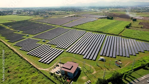 Aerial flyby view of Raslag Solar Power Plant, Mexico, Pampanga, Philippines, along NLEX highway.