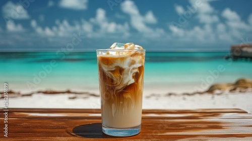 Refreshing iced coffee on a tropical beach with clear blue waters and palm tr...