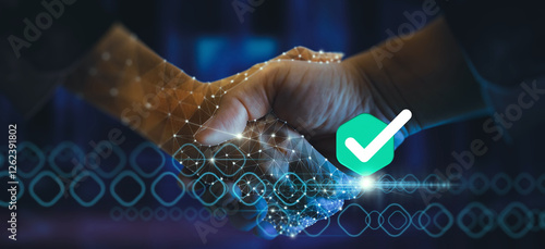 Obraz na płótnie A futuristic handshake with a glowing digital network overlay and a green approval checkmark symbolizes trust, technology, and verified business agreements in the digital age. w salonie