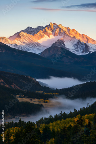 Golden Dawn Over Snow-Capped Peaks and Serene Valley