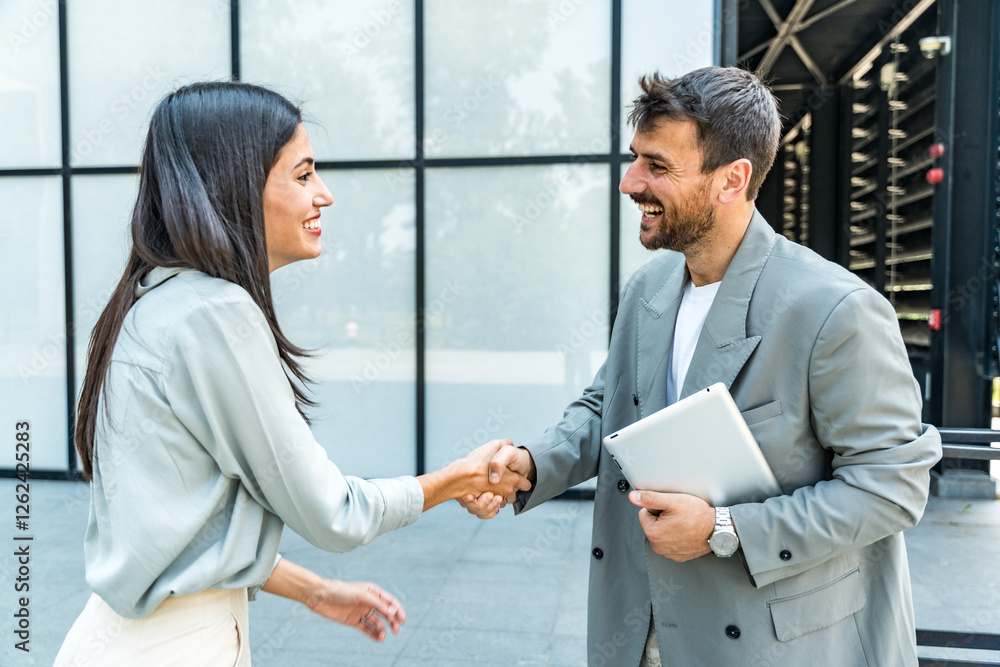 Professional occupation, office workers. Two business people meet before staff meeting and presentation in office building, to talk and discus plans and tactic of speech theme. Finance and economy. Professional occupation, office workers. Two business people meet before staff meeting and presentation in office building, to talk and discus plans and tactic of speech theme. Finance and economy.