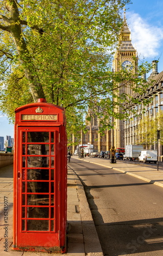 Obraz na płótnie Red telephone box on Victoria embankment with Big Ben at background, London, UK w salonie