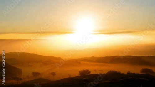 Wallpaper Mural Sunrise over rolling hills captures the serene beauty of nature at dawn in a tranquil landscape Torontodigital.ca