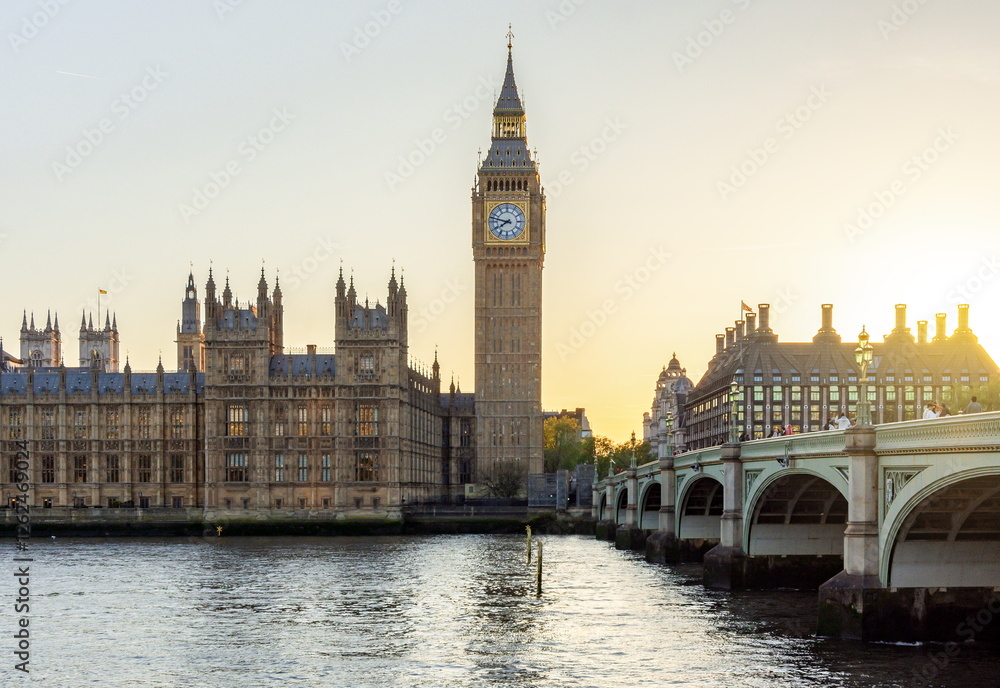 Houses of Parliament with Big Ben tower and Westminster bridge at sunset, London, UK Houses of Parliament with Big Ben tower and Westminster bridge at sunset, London, UK