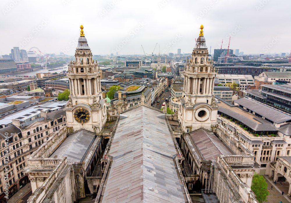 Naklejka premium Towers of St. Paul's cathedral and London cityscape, UK