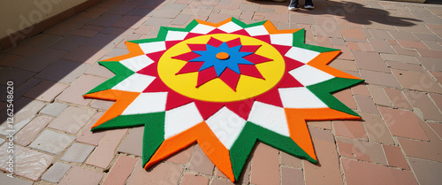 Artistic rangoli design in vibrant tricolors at community center, tradition photo