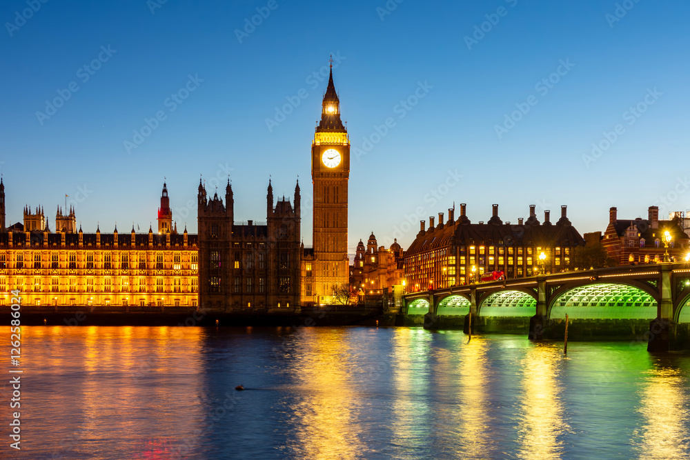 Big Ben tower and Westminster bridge at night, London, UK Big Ben tower and Westminster bridge at night, London, UK