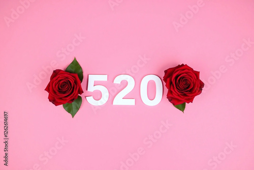 two red roses pink background number 520 red green leaves