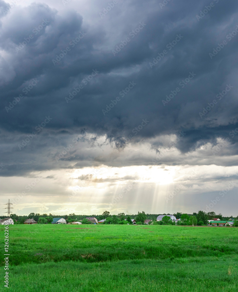 Stormy sky with a bright sun shining through the clouds Stormy sky with a bright sun shining through the clouds