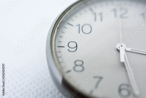 Wallpaper Mural Close - up of a black watch on the white background. Мacro of a clock. Mechanical watch with hands and numbers Torontodigital.ca